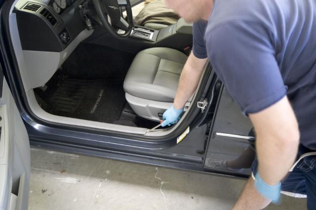 Removing the panels from the vehicle so that we can run the wires